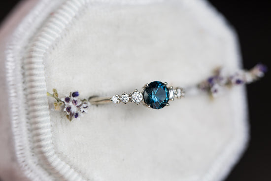 Montana sapphire and diamond seven stone ring