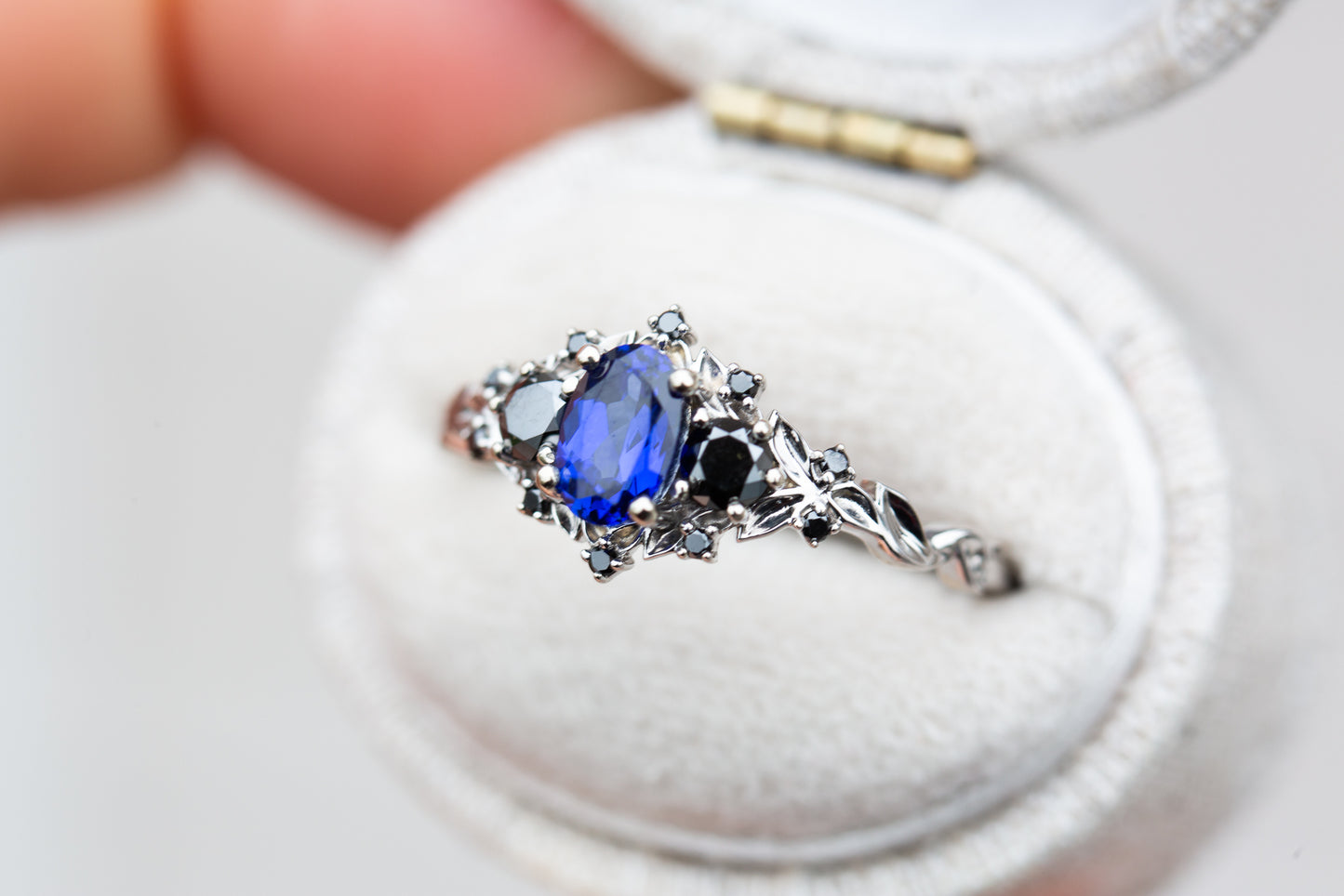 Briar rose three stone with blue sapphire and black diamonds