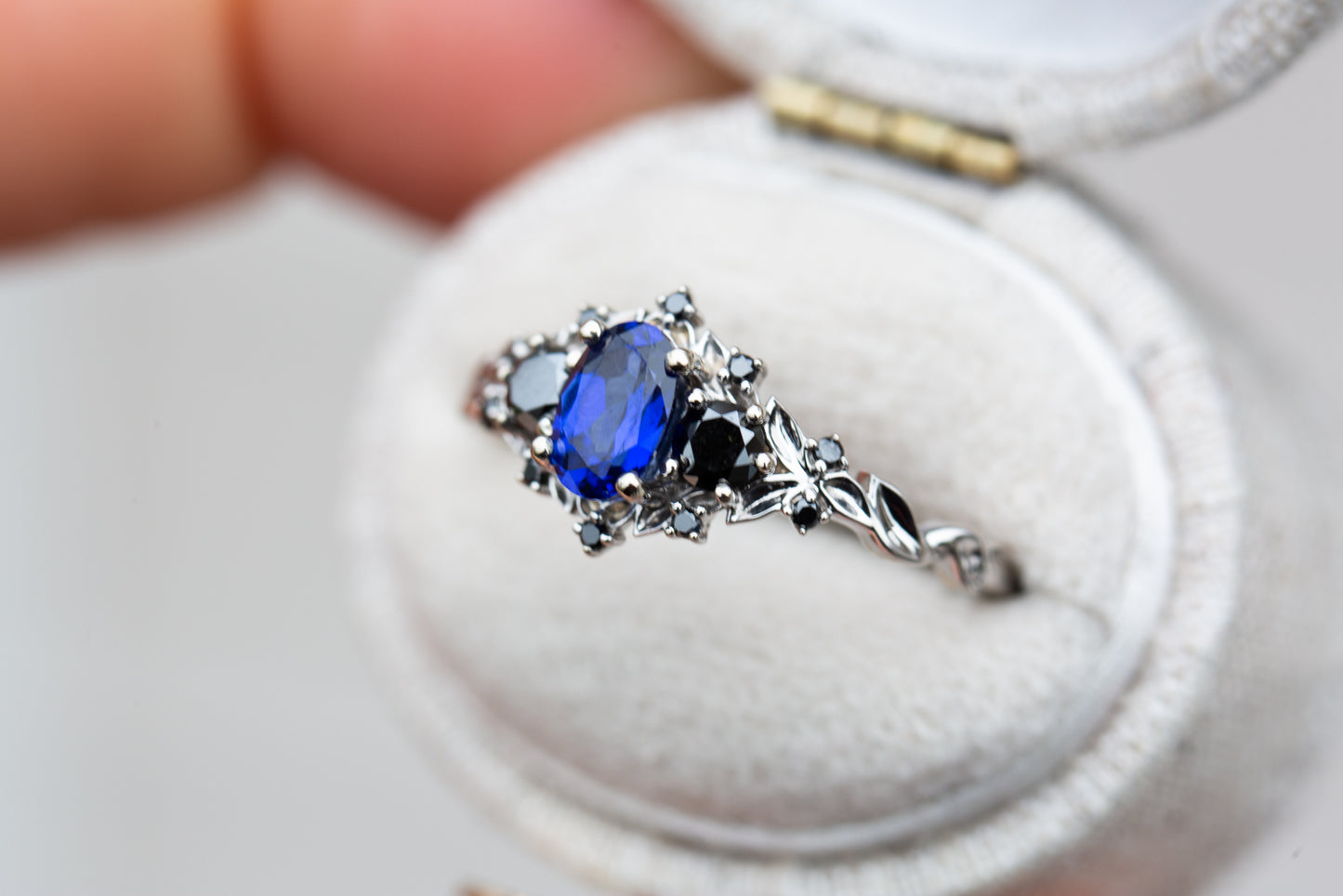 Briar rose three stone with blue sapphire and black diamonds