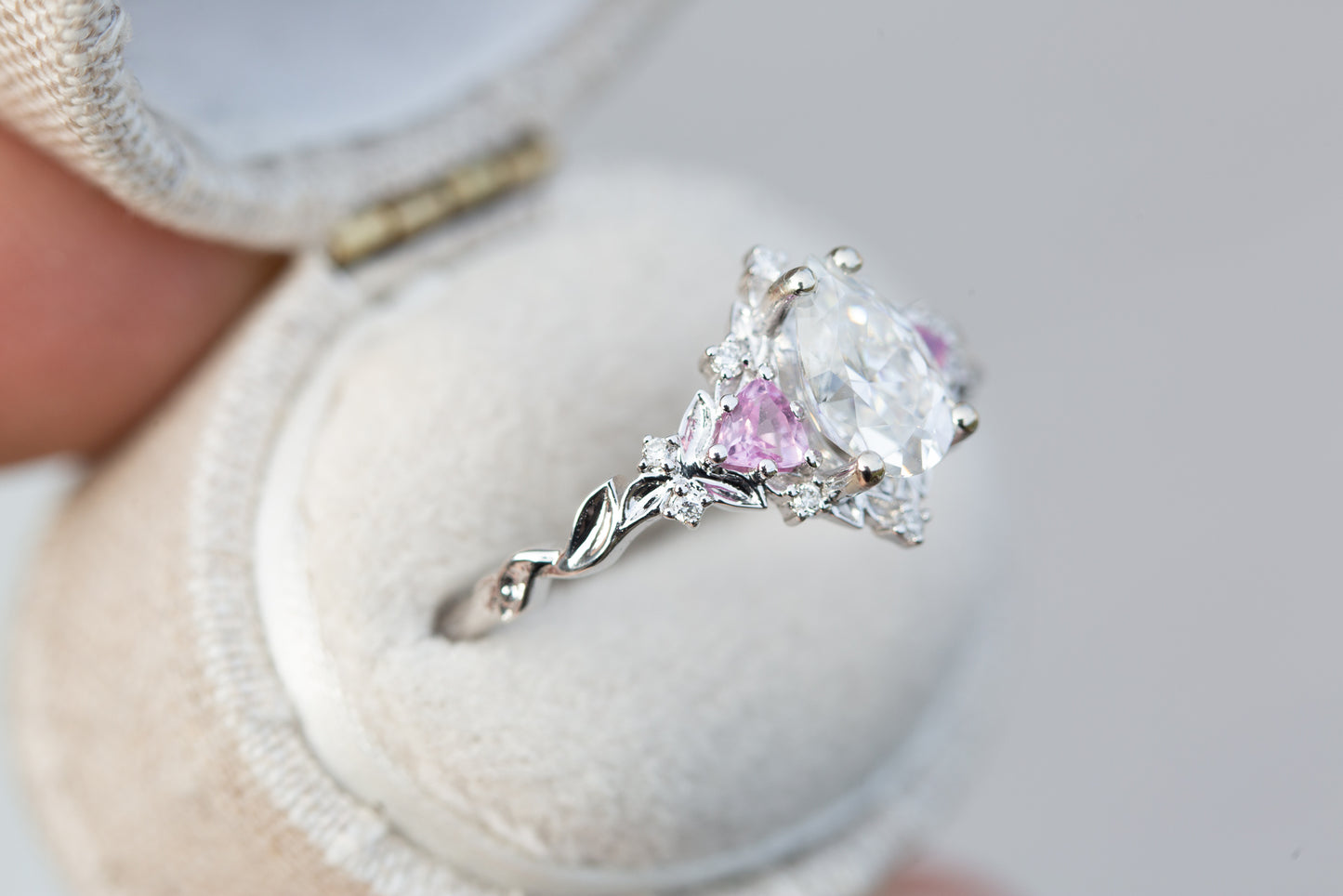 Briar rose three stone with pear moissanite and pink sapphire