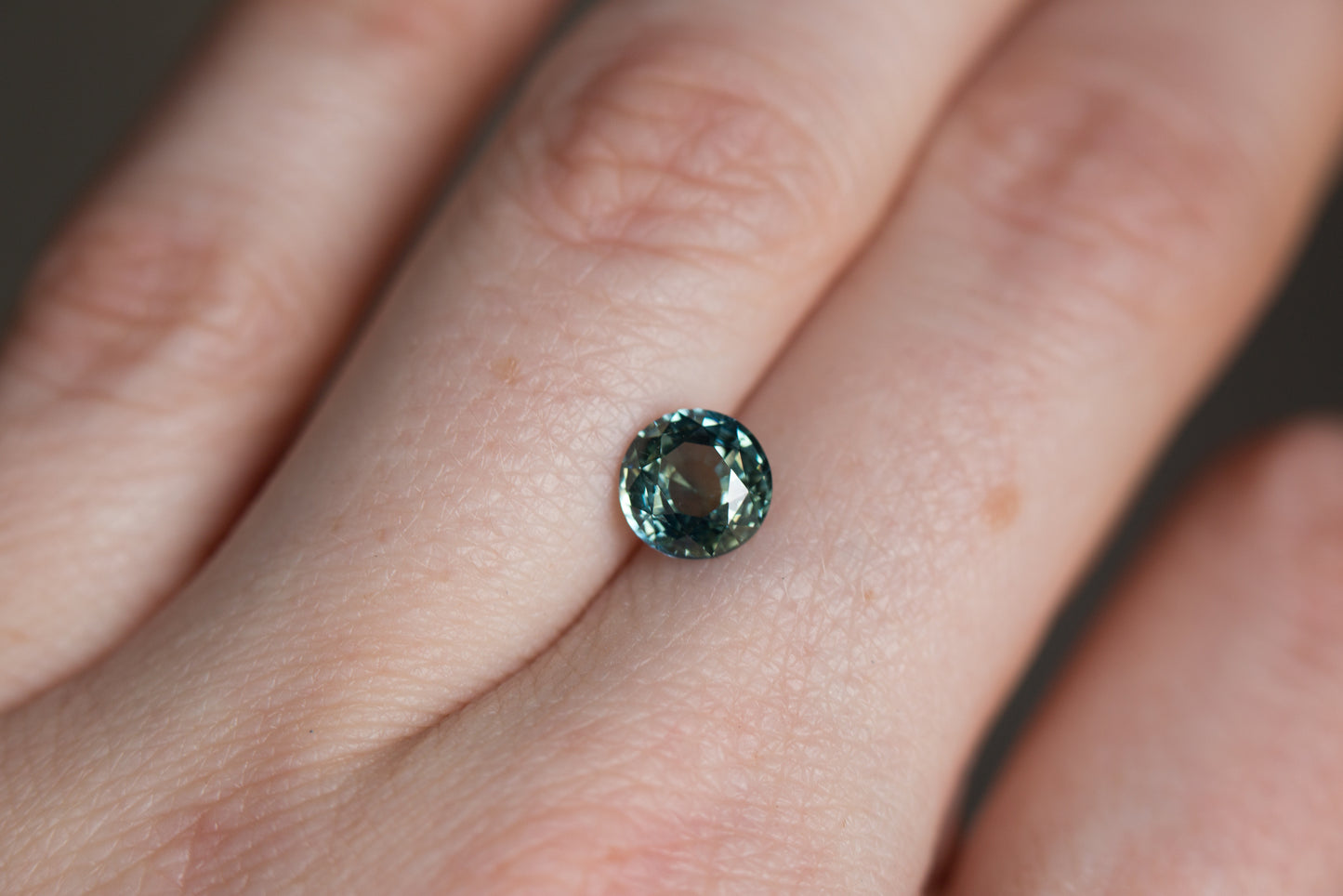1.77ct round blue green sapphire