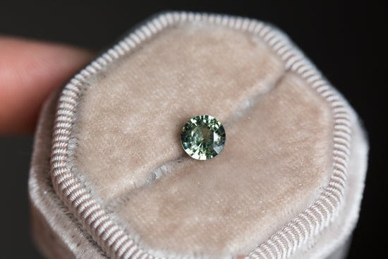1.08ct round medium green sapphire