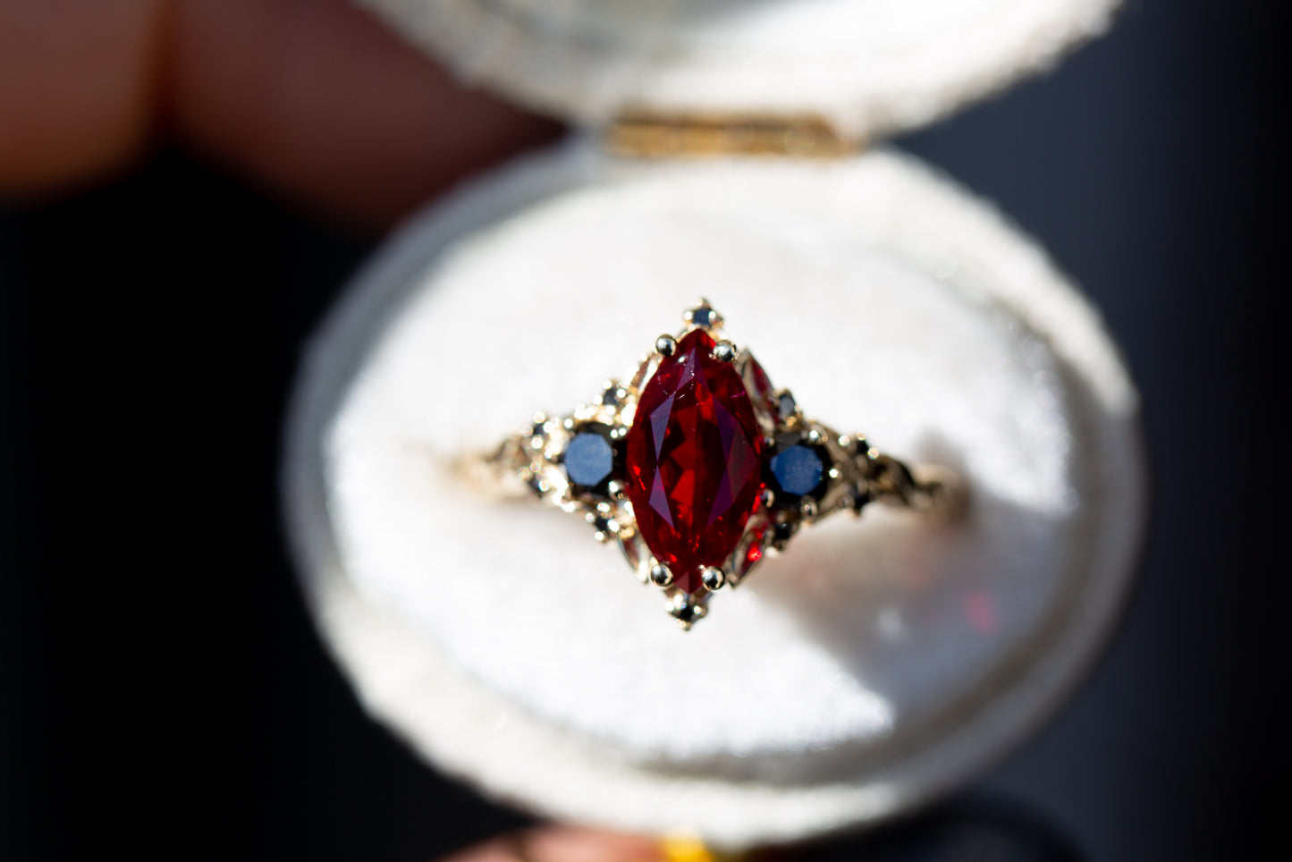 Briar rose three stone with marquise lab ruby and black diamonds