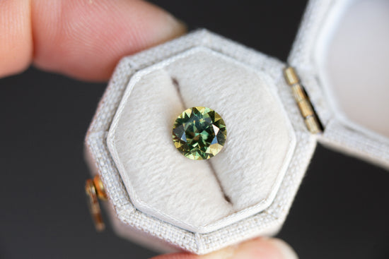 2.1ct round yellow green sapphire