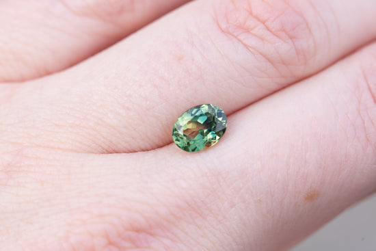 1.6ct oval parti green yellow sapphire