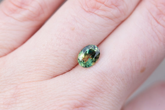 1.6ct oval parti green yellow sapphire