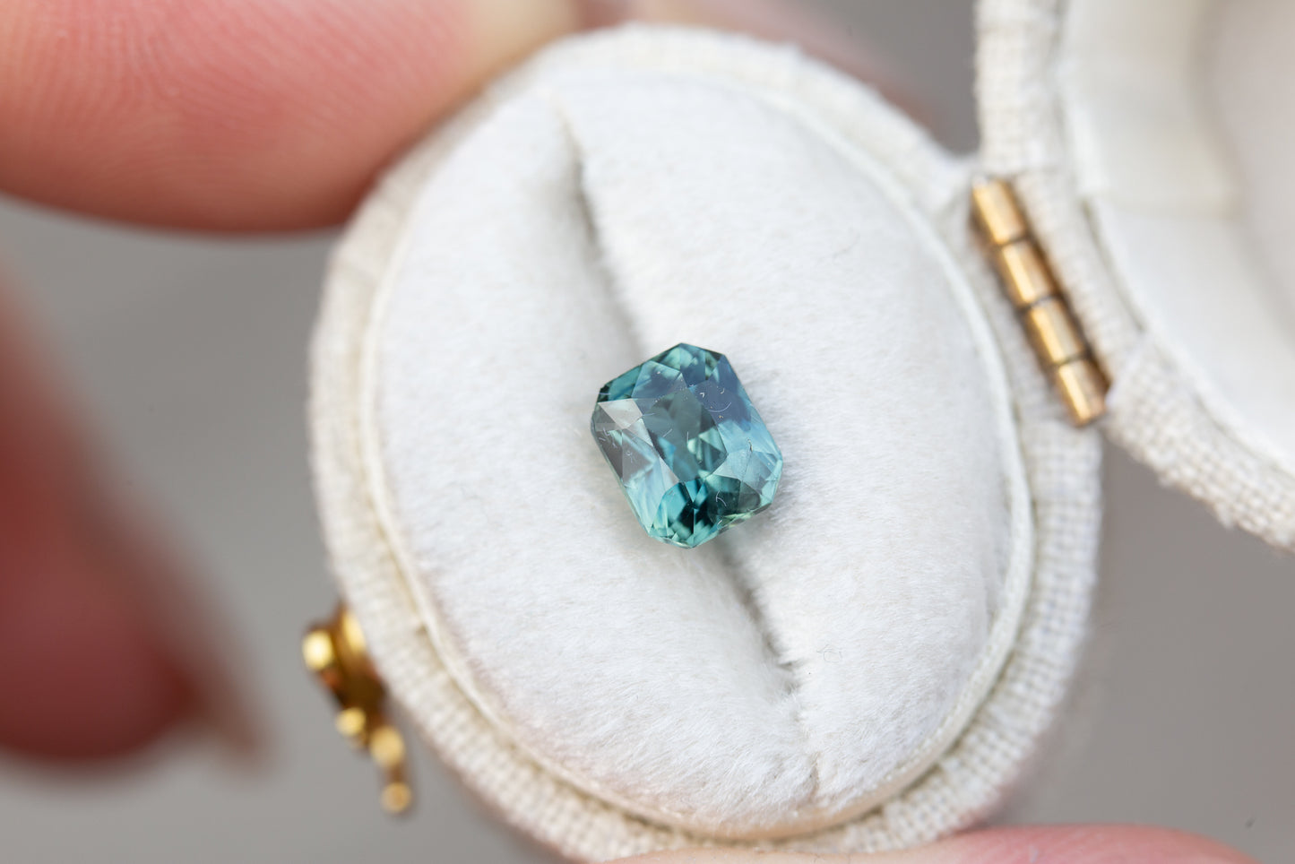 1.67ct radiant cut teal blue sapphire