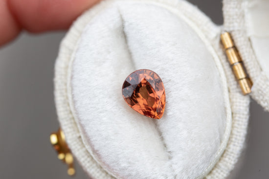 Load image into Gallery viewer, 1.8ct pear burnt orange sapphire
