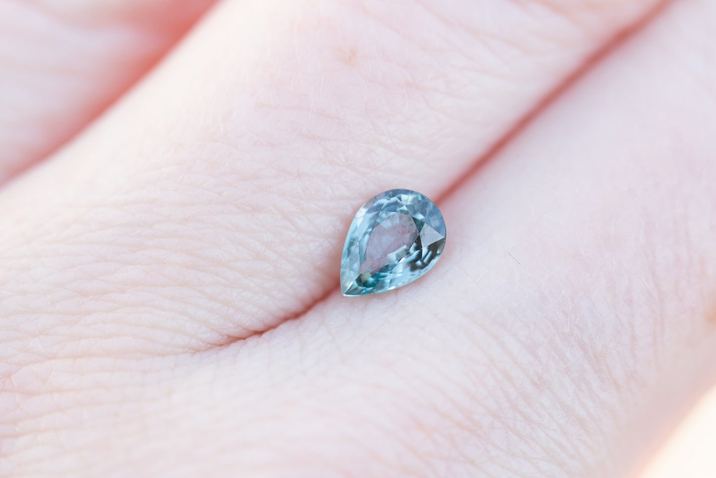 Load image into Gallery viewer, .89ct pear teal blue sapphire
