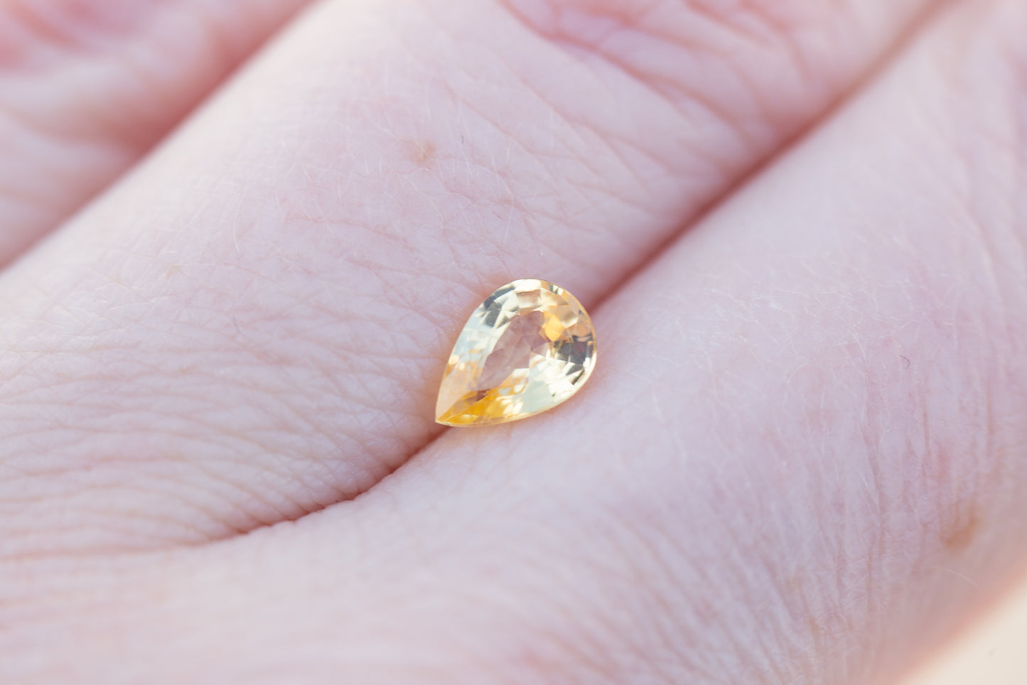 Load image into Gallery viewer, .85ct pear yellow sapphire
