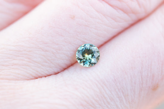 .72ct round teal green sapphire
