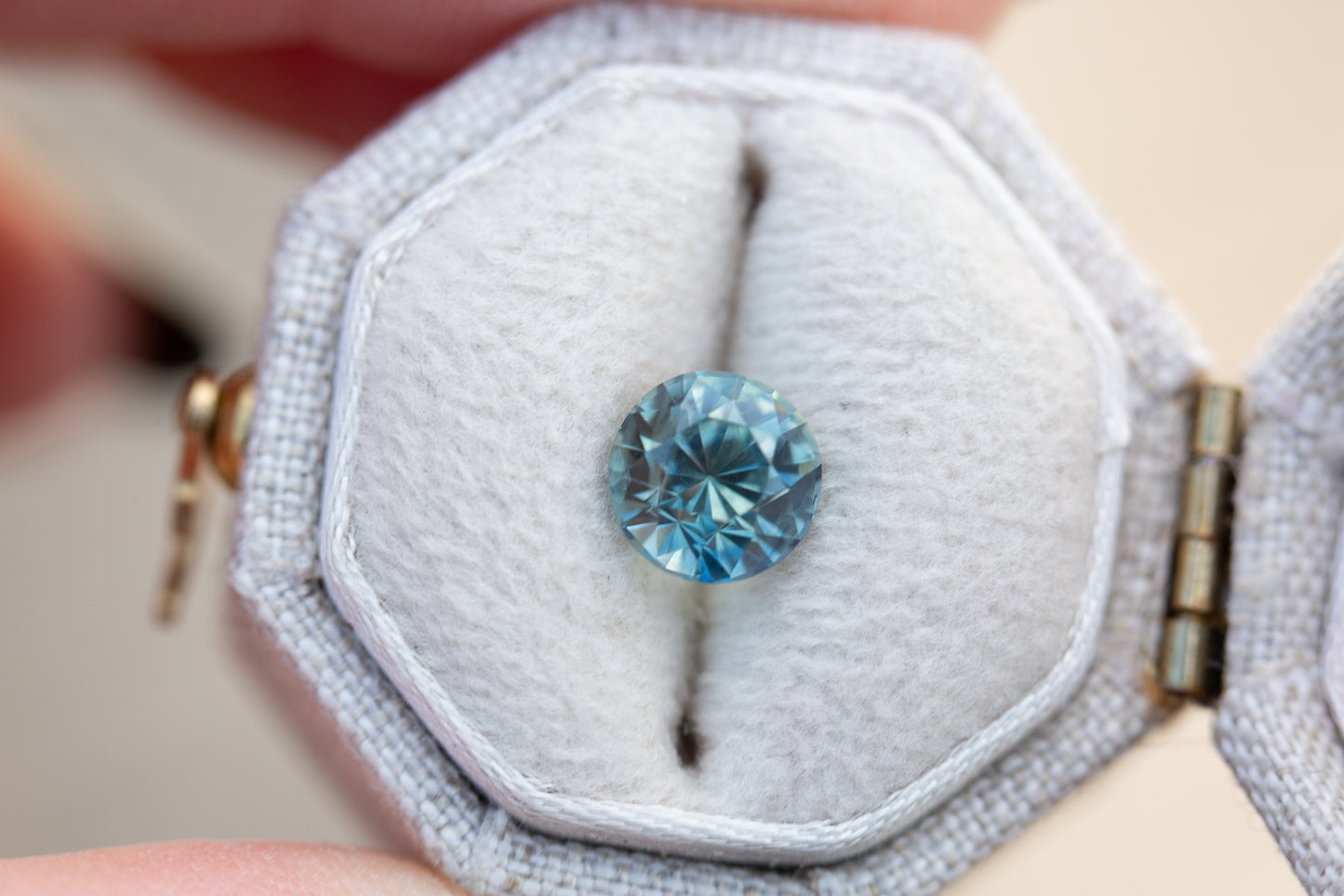 1.7ct round light teal sapphire