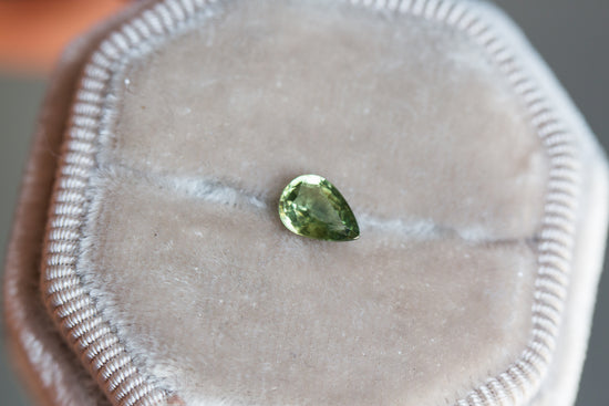 .74ct olive green pear sapphire