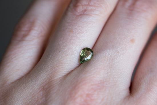 .74ct olive green pear sapphire