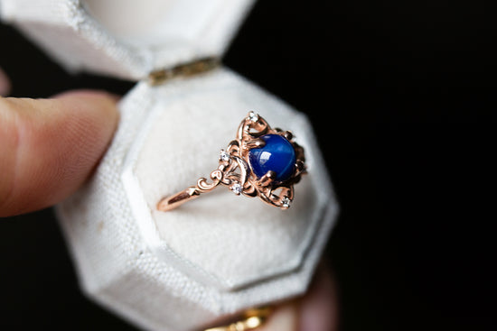 Round star sapphire Aurora ring with crescent moons