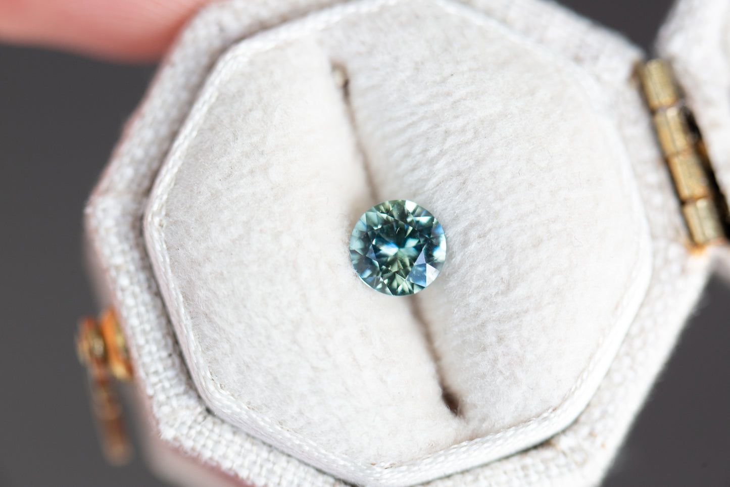 Load image into Gallery viewer, ON HOLD - .53ct round teal blue sapphire
