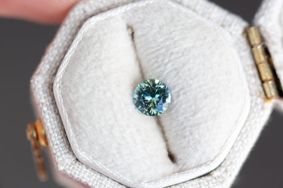 Load image into Gallery viewer, ON HOLD - .53ct round teal blue sapphire
