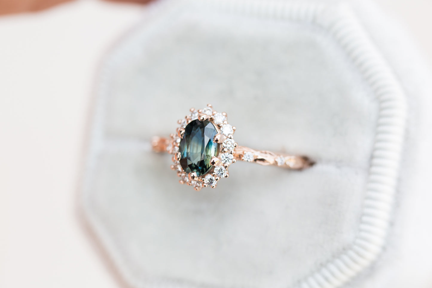 Oval blue green halo leaf ring, Eqwene setting