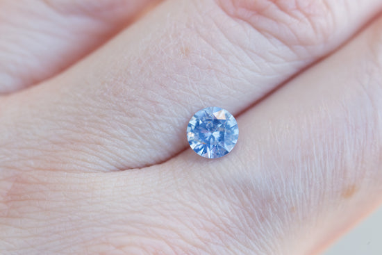 Load image into Gallery viewer, .98ct round opalescent blue/lavender sapphire
