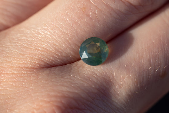 2.06ct round opalescent teal/green sapphire