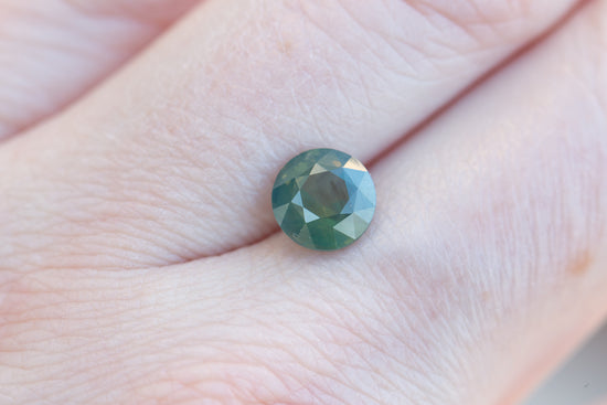 2.06ct round opalescent teal/green sapphire
