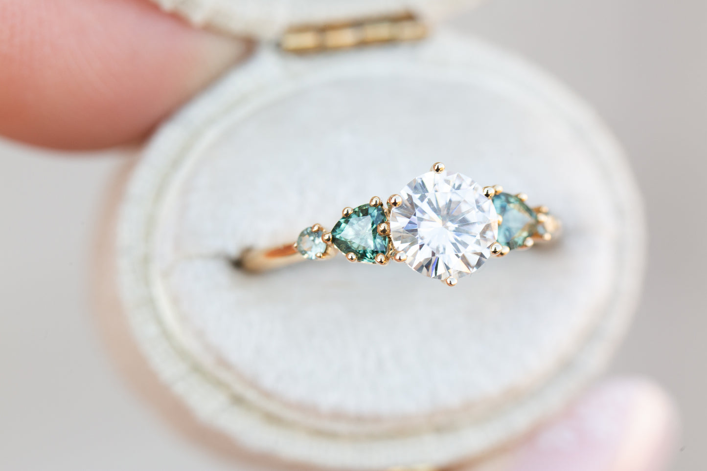 Load image into Gallery viewer, Five stone round moissanite and teal sapphire ring
