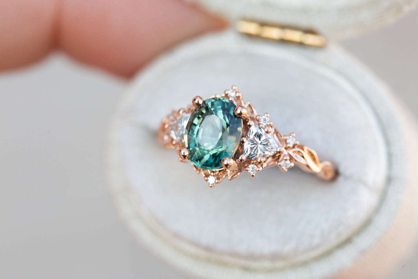 Briar rose three stone with 1.58ct green teal sapphire