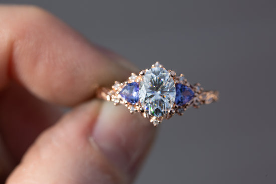 Briar rose three stone with 8x6mm oval moissanite and tanzanite