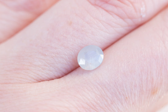 1.25ct oval opalescent white/opaque white
