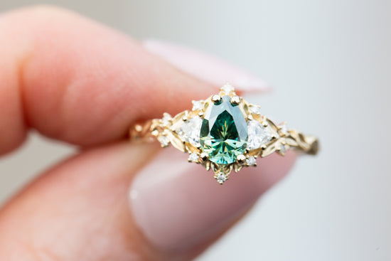 Load image into Gallery viewer, Briar rose three stone with pear teal moissanite
