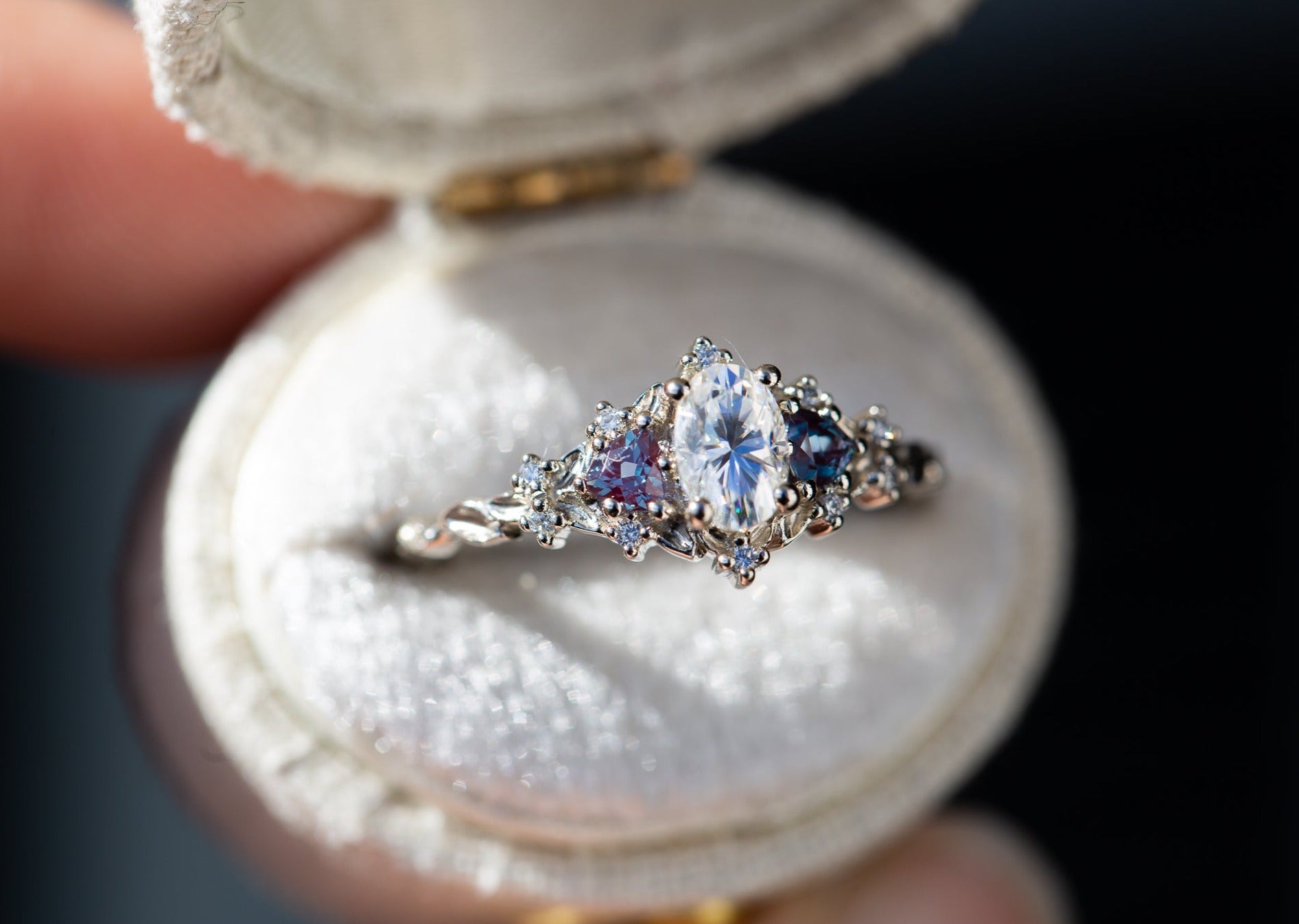Briar Rose Three Stone with 6x4mm oval moissanite and alexandrite