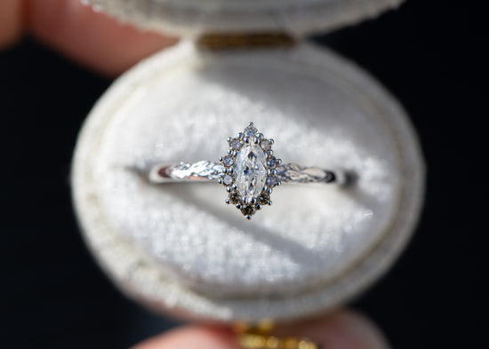 Midsummer setting with marquise center and champagne diamonds