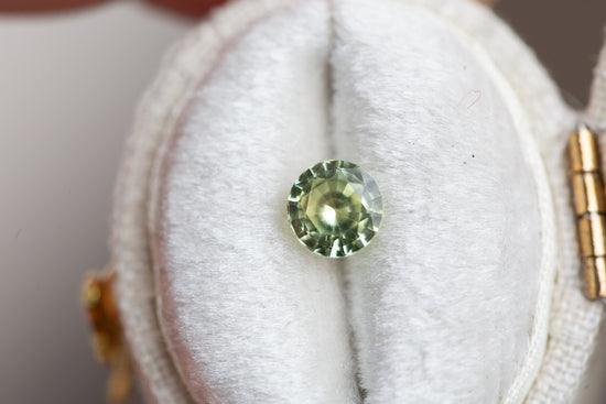 .76ct round green yellow sapphire