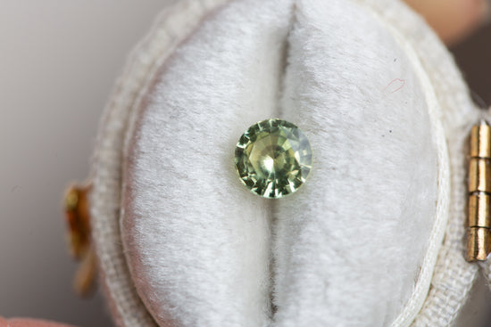 .76ct round green yellow sapphire