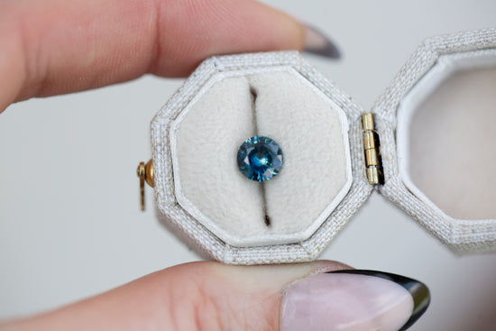 1.12ct round blue/teal sapphire