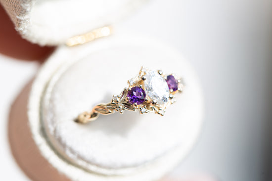Load image into Gallery viewer, Briar rose three stone with oval moissanite and round amethyst side stones (fairy queen)
