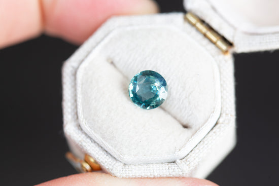 1.5ct round blue green teal sapphire