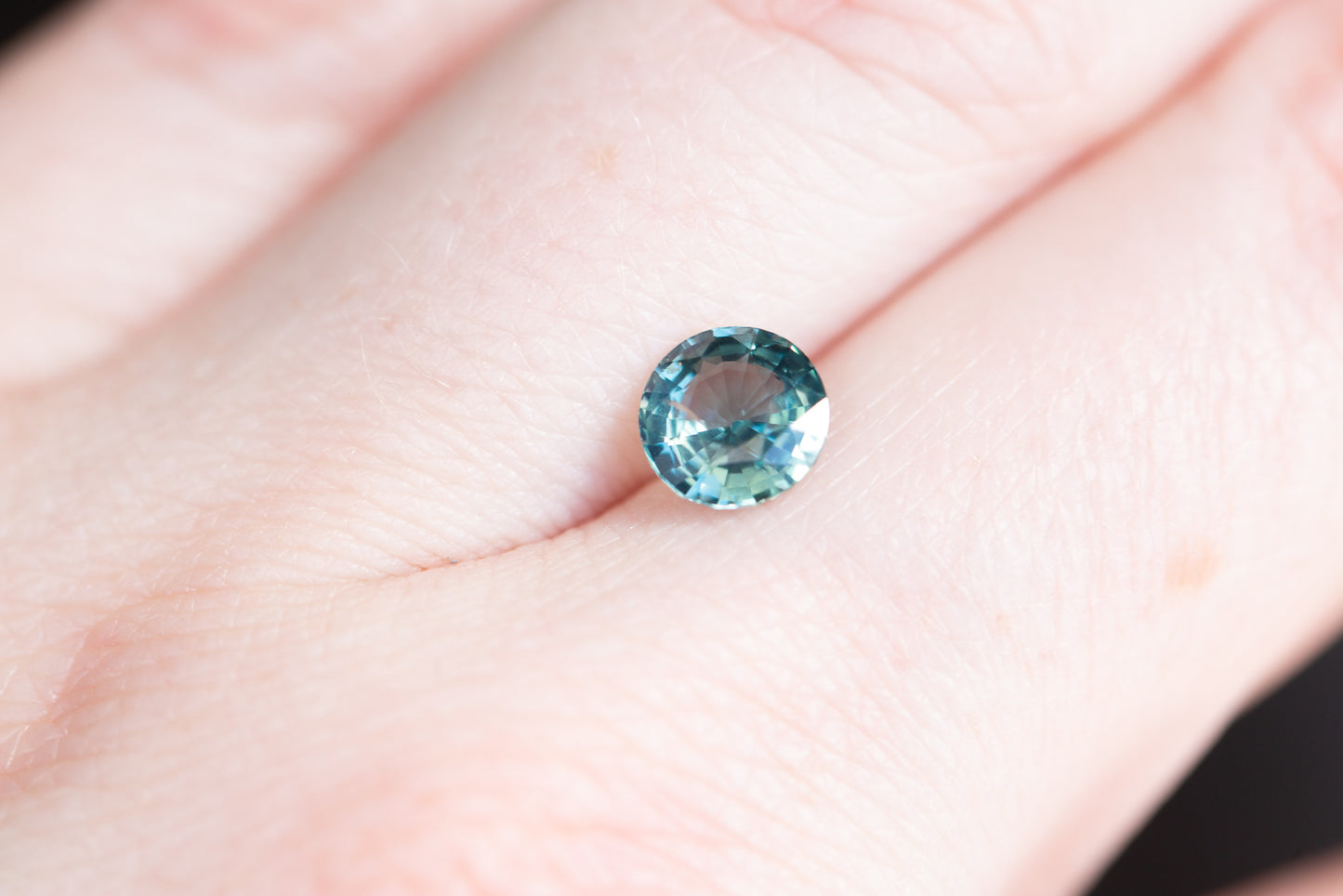 1.5ct round blue green teal sapphire