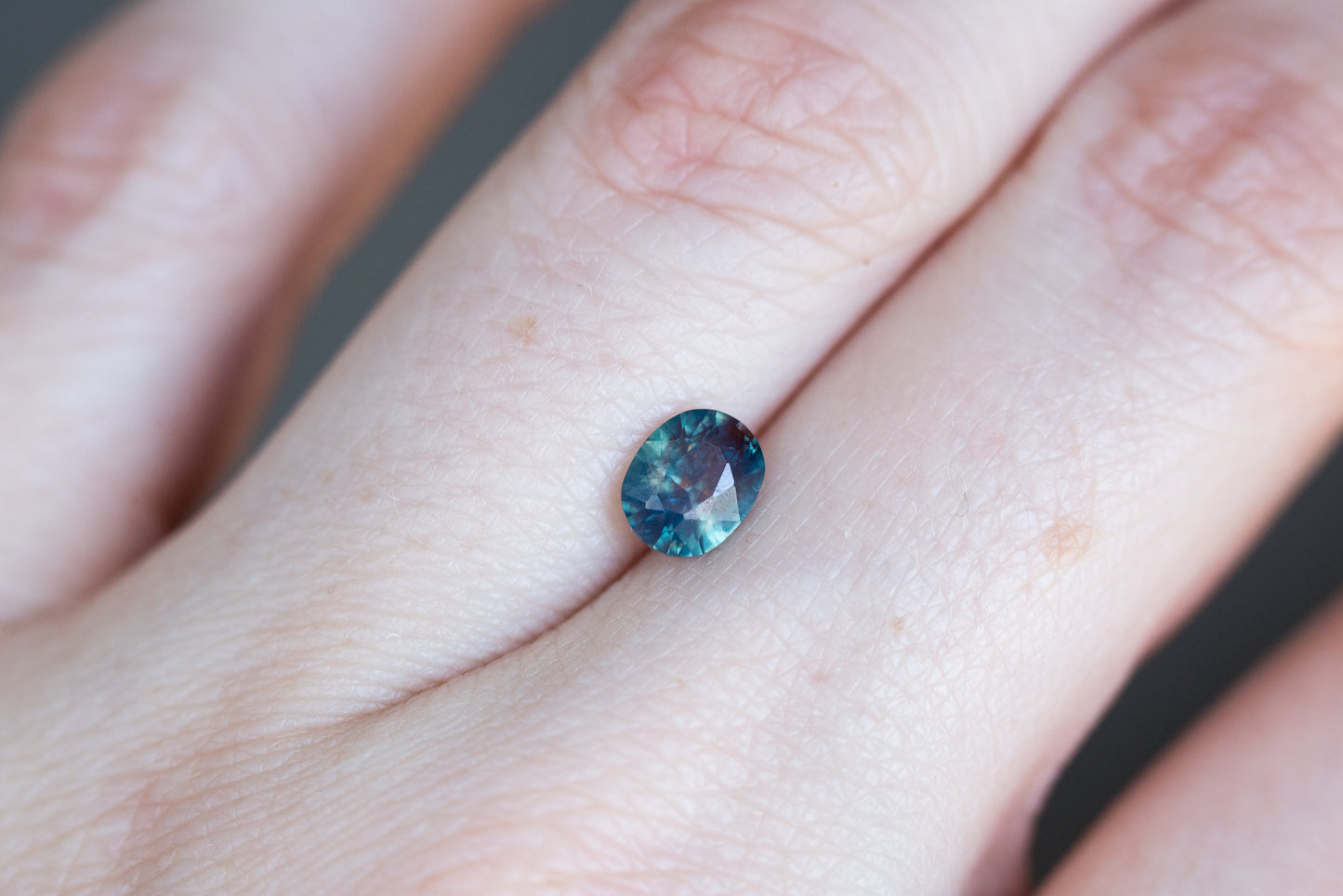 .96ct oval opalescent teal sapphire