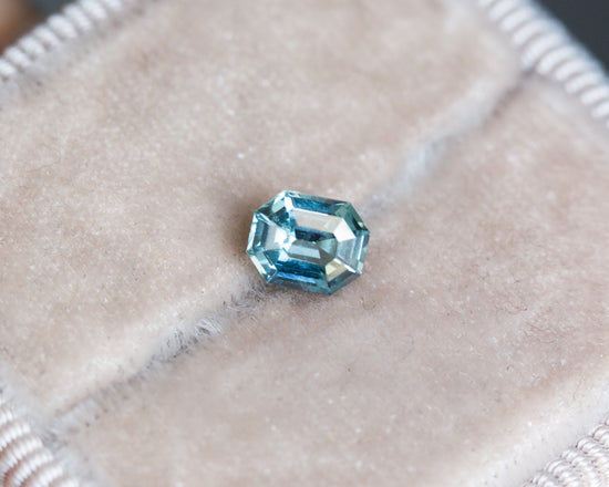 .97ct teal blue emerald cut sapphire