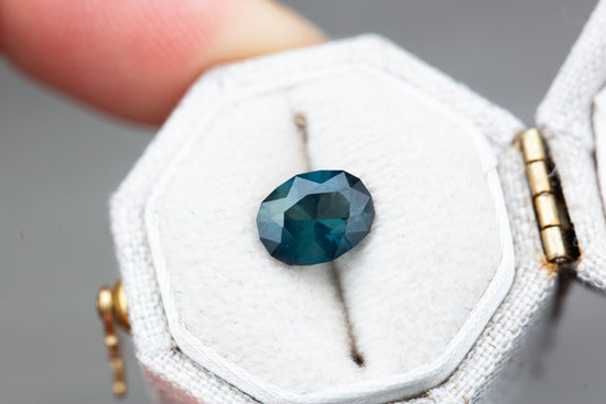 1.65ct oval precision cut deep blue green sapphire