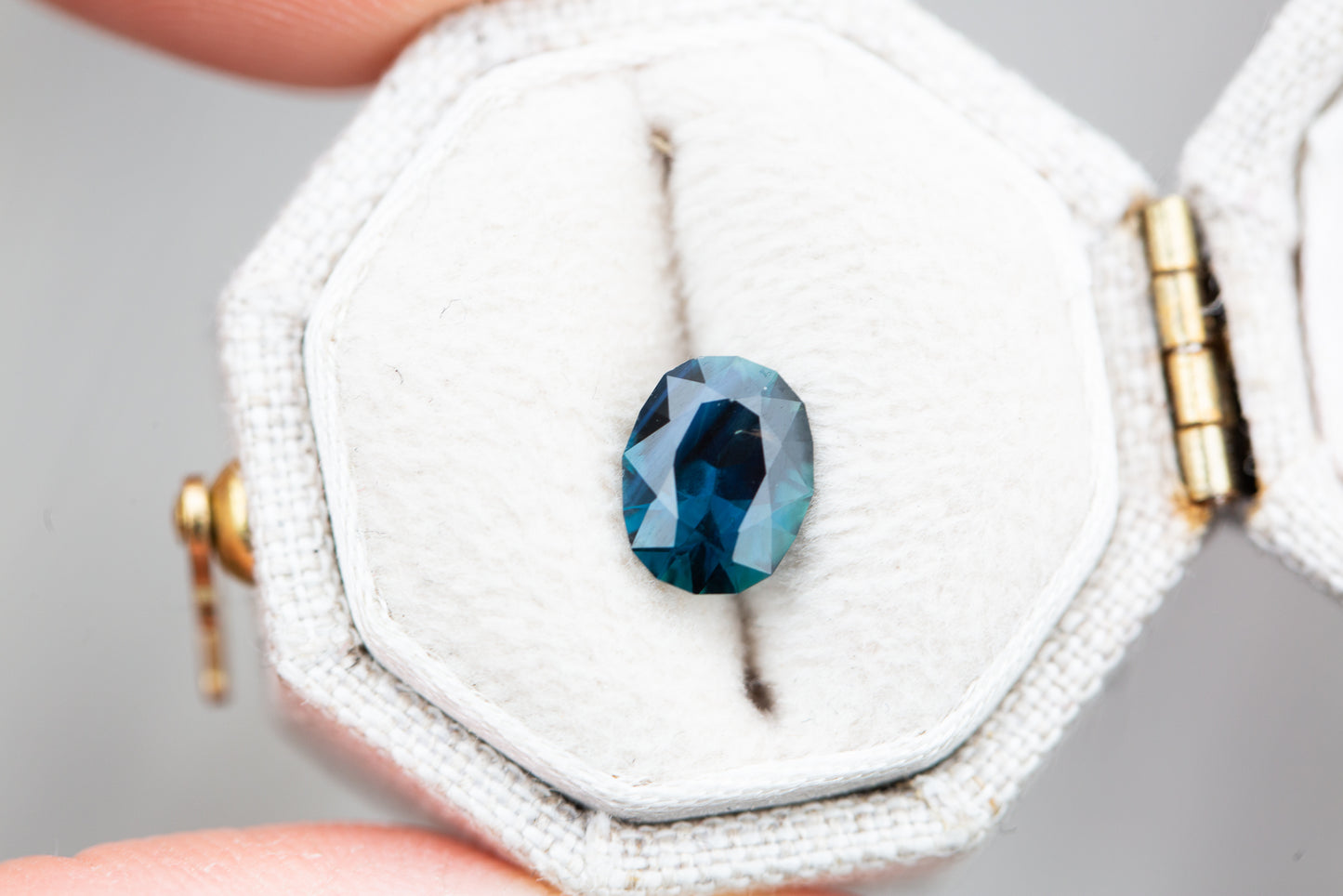 Load image into Gallery viewer, ON HOLD 1.34ct oval precision cut dark blue teal sapphire
