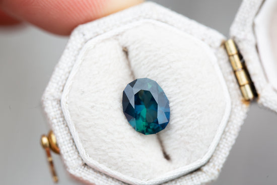 1.96ct oval precision cut deep dark blue green sapphire