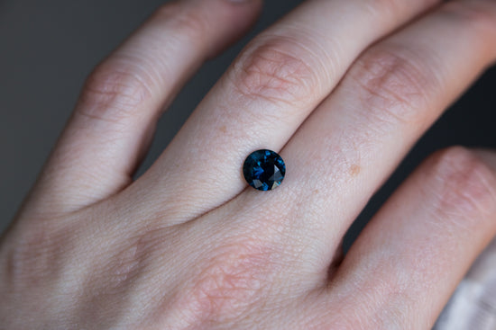 2.04ct round dark blue sapphire
