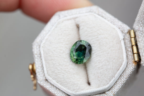 1.37ct oval darker green sapphire