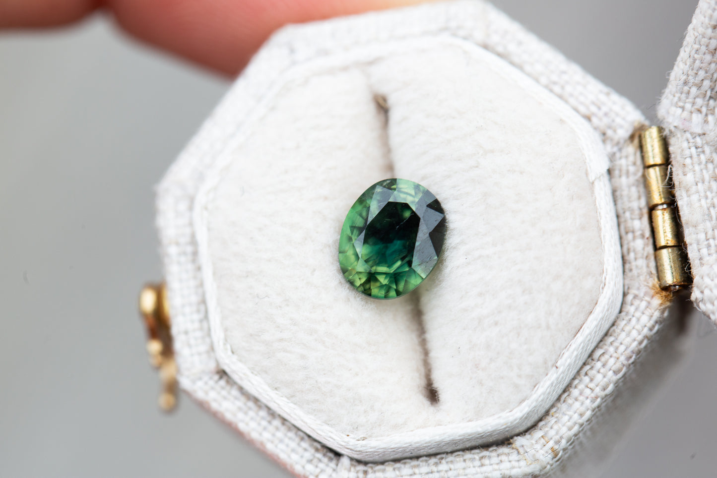 1.37ct oval darker green sapphire