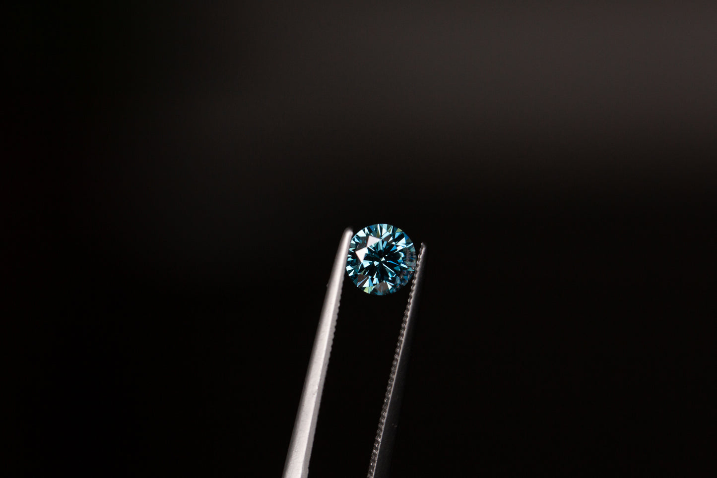 Load image into Gallery viewer, .64ct round fancy vivid blue lab diamond
