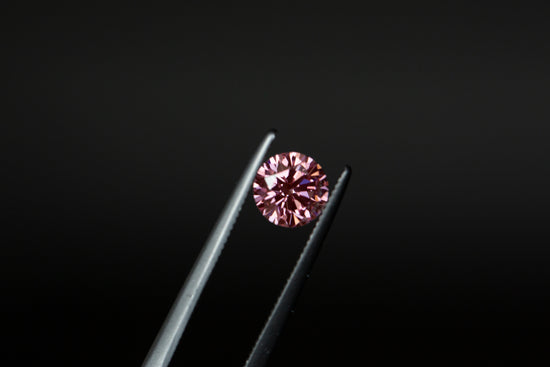 .58ct round fancy vivid pink lab diamond