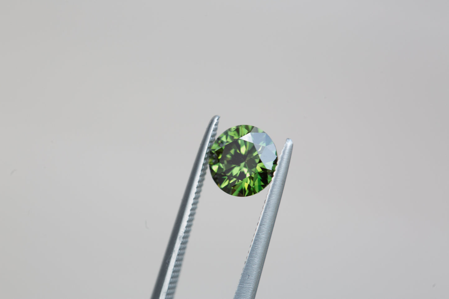 .88ct round fancy vivid green lab diamond