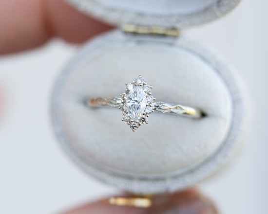 Midsummer setting with marquise center and champagne diamonds